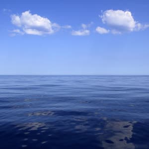 Calm Horizons: Vast Ocean Harmonious Waves - Gazebo Clouds